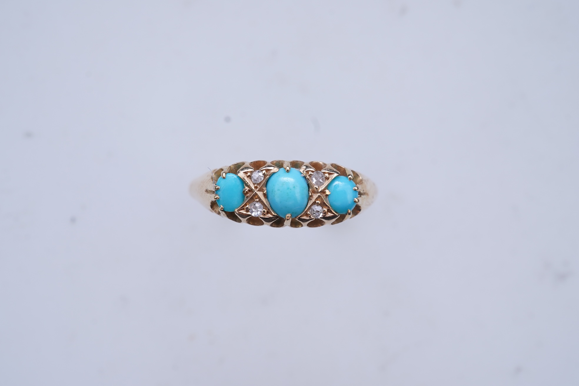 A turquoise and diamond ring, late 19th/early 20th century